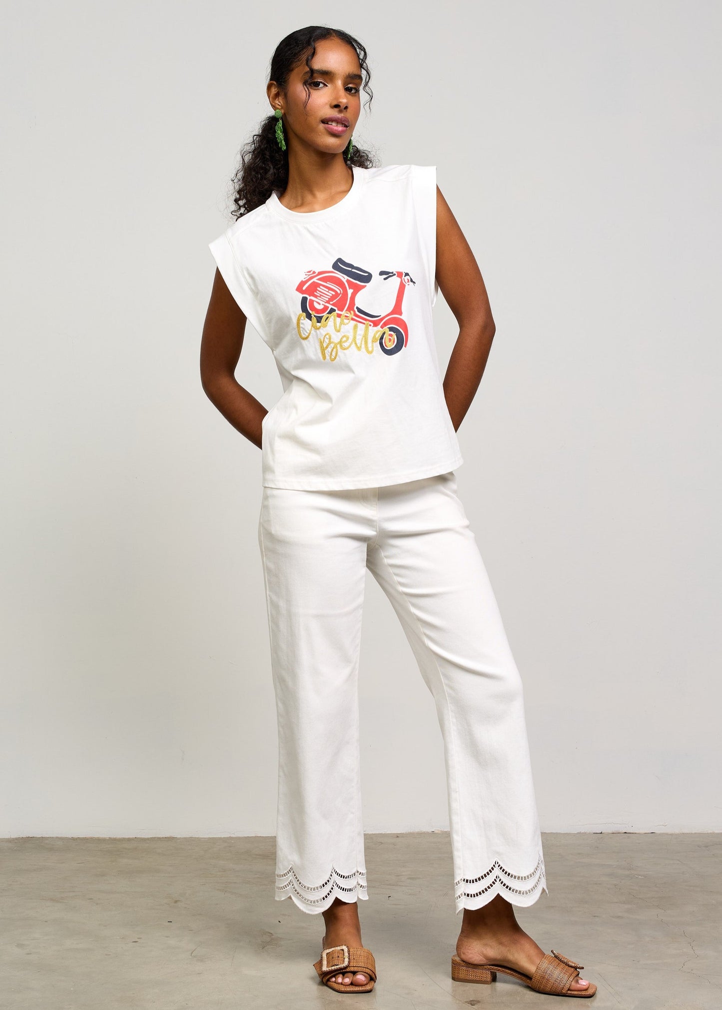 SKIES ARE BLUE THE SLEEVELESS GRAPHIC SHIRT – A VINTAGE-INSPIRED EMBROIDERED BUTTON-UP WITH A VESPA DESIGN AND "CIAO BELLA" DETAIL