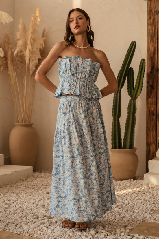 SKIES ARE BLUE PLEATED STRAPLESS TOP – A CHARMING COTTON TOP WITH PEPLUM HEM AND ACCORDION FOLDS