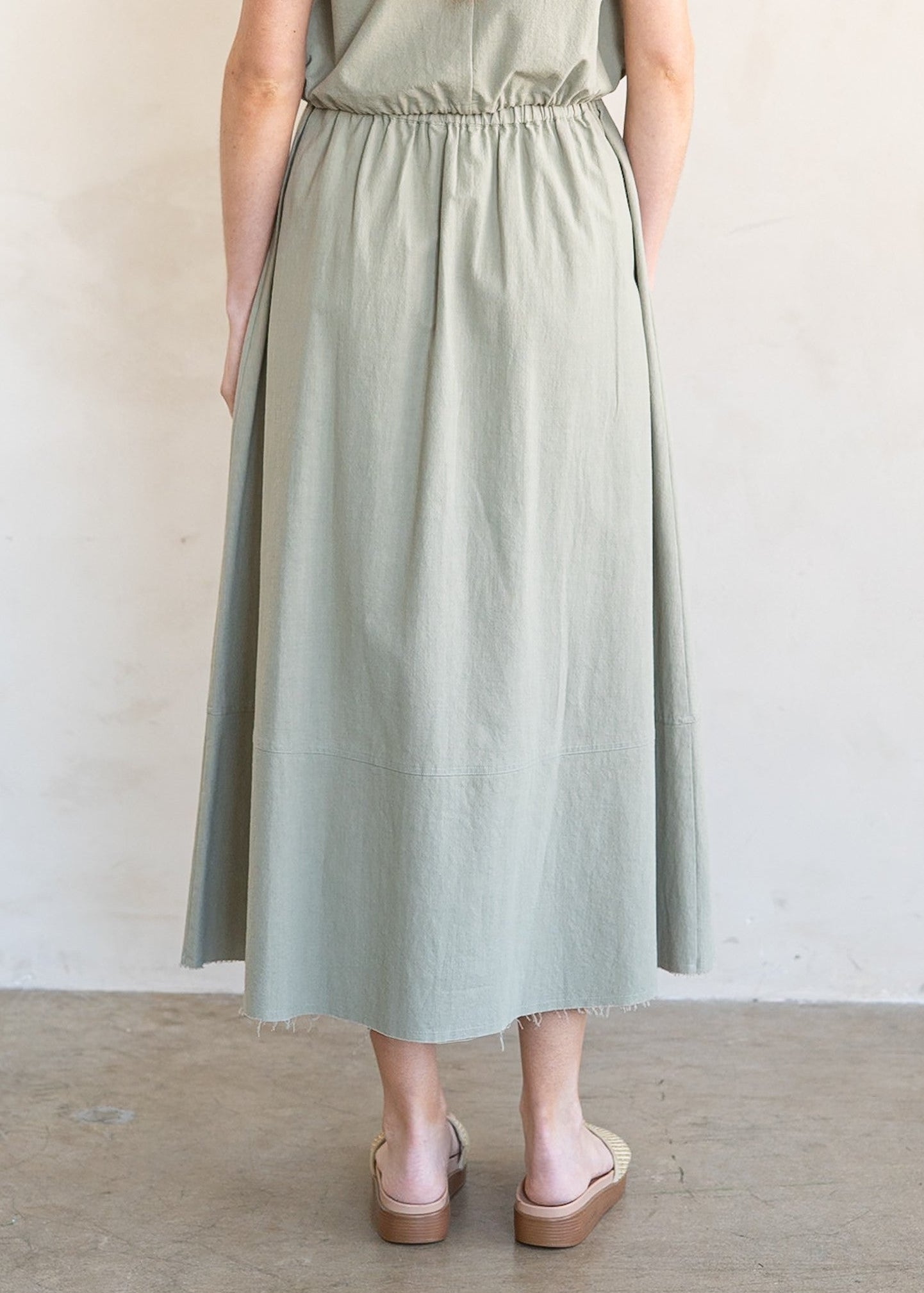 TANA FLARED MIDI SKIRT