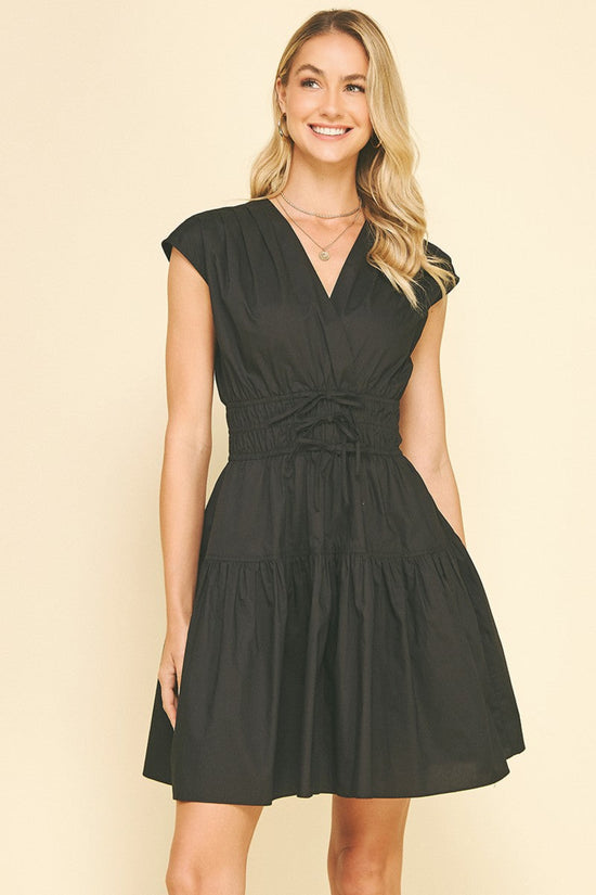 PINCH TIE DETAILED MINI DRESS – A FLIRTY V-NECK MINI WITH SMOCKING, TIERS, AND POCKETS