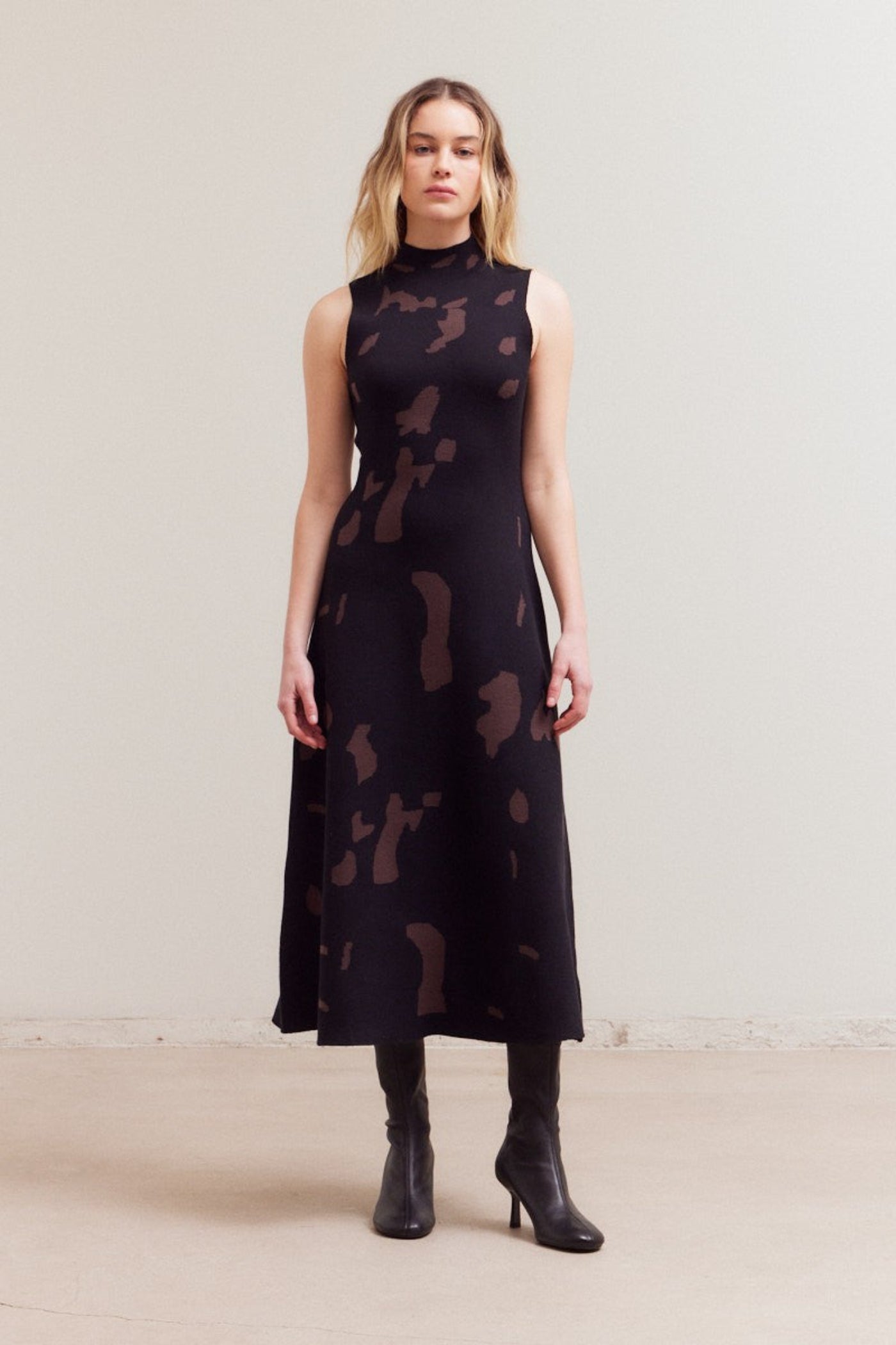 GRADE & GATHER FITTED KNIT HIGH NECK MIDI DRESS – COW PRINT IN BLACK & BROWN