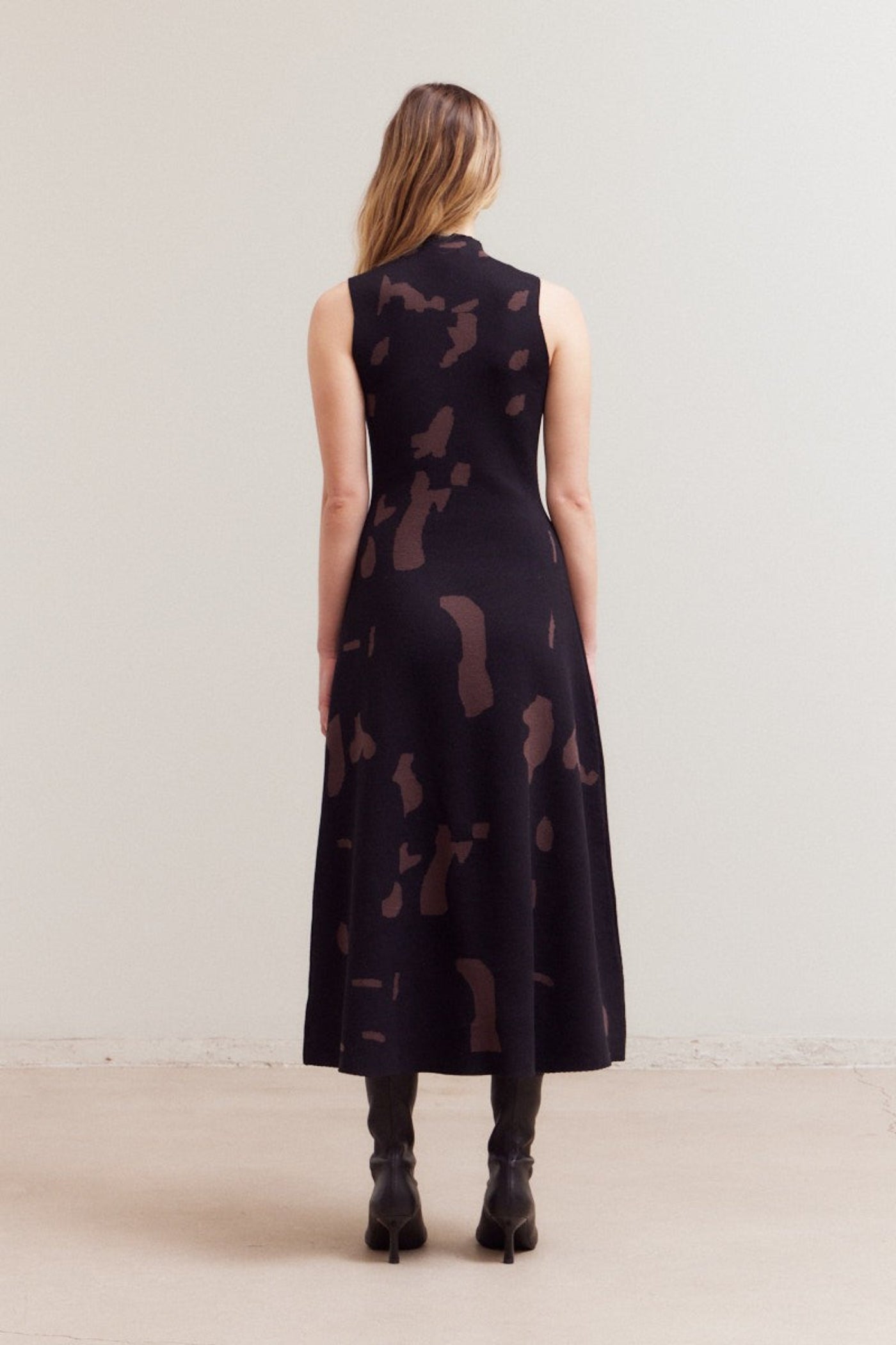 GRADE & GATHER FITTED KNIT HIGH NECK MIDI DRESS – COW PRINT IN BLACK & BROWN