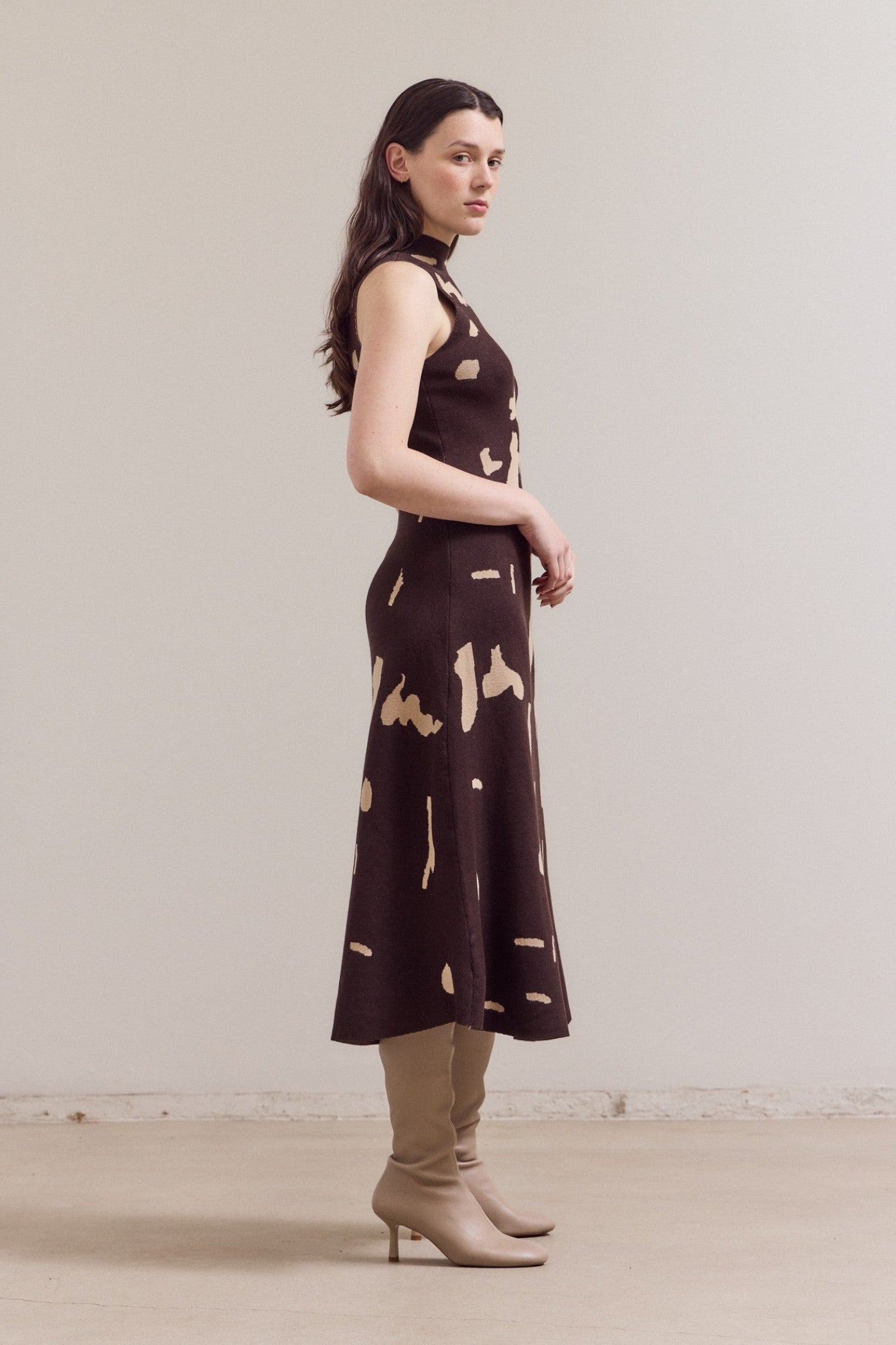 GRADE & GATHER FITTED KNIT HIGH NECK MIDI DRESS – COW PRINT IN BLACK & BROWN