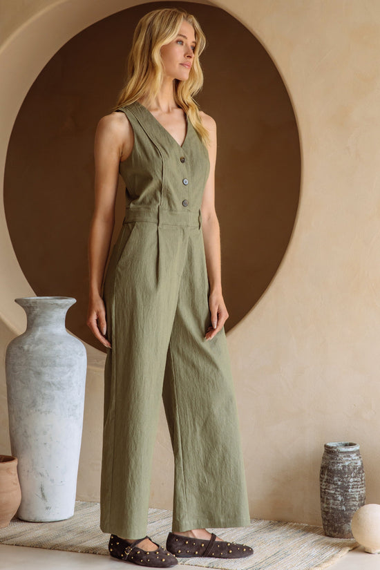 SKIES ARE BLUE BUTTON DOWN JUMPSUIT WITH CUTOUT BACK – AN OLIVE JUMPSUIT WITH A RELAXED FIT AND STYLISH BACK DETAIL