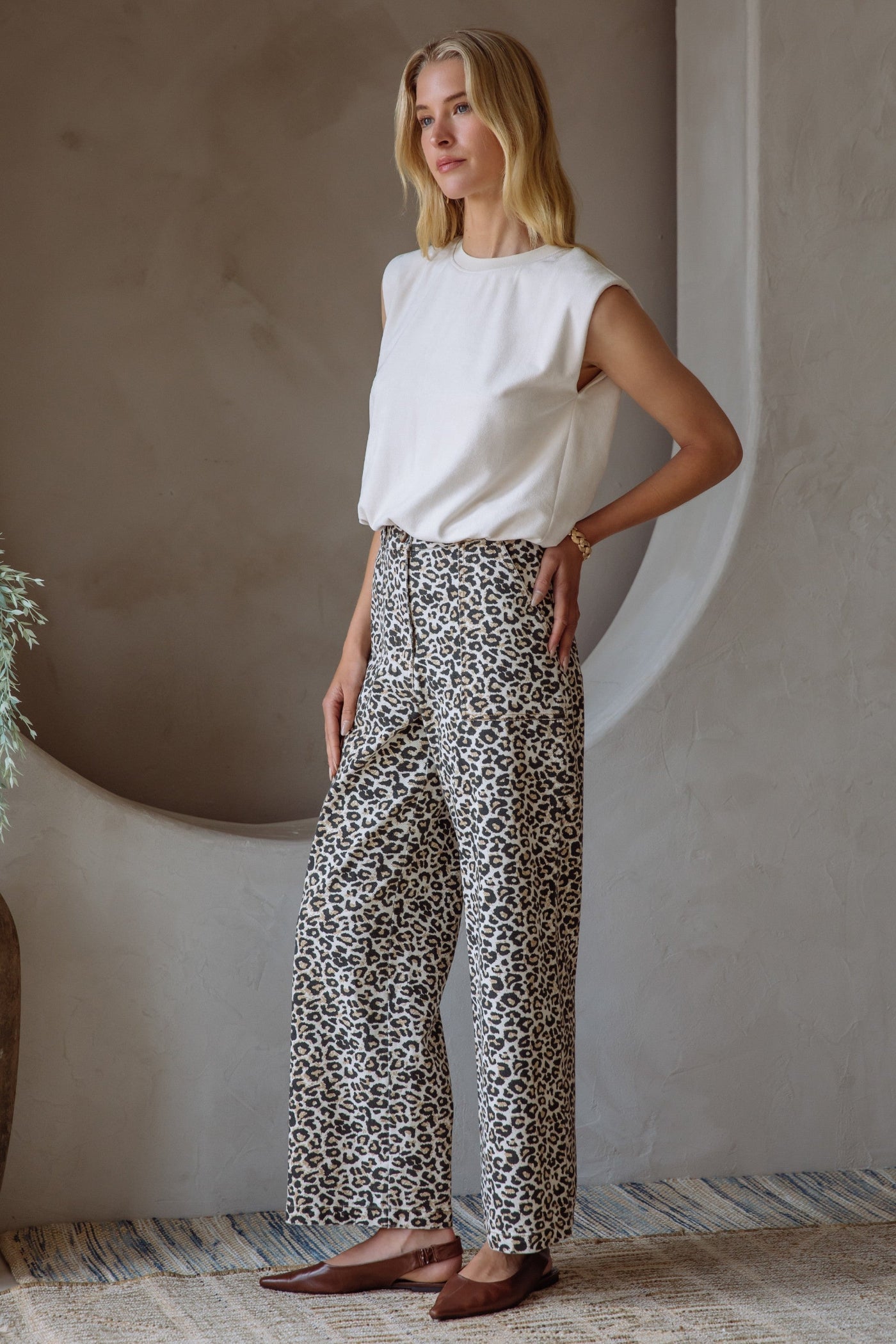 SKIES ARE BLUE WASHED LEOPARD PRINT PANTS – A HIGH-WAISTED STATEMENT PANT WITH A FRONT SEAM AND SUBTLE EDGE