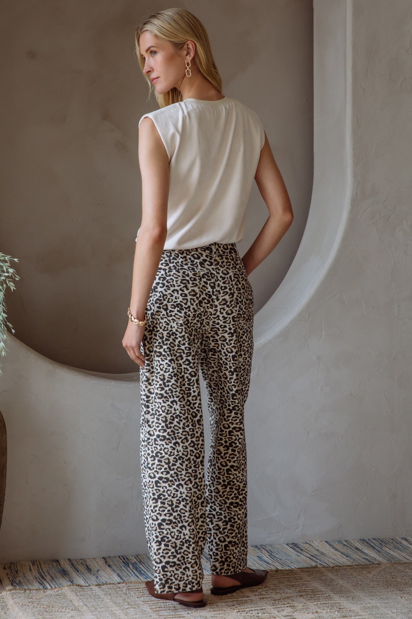 SKIES ARE BLUE WASHED LEOPARD PRINT PANTS – A HIGH-WAISTED STATEMENT PANT WITH A FRONT SEAM AND SUBTLE EDGE