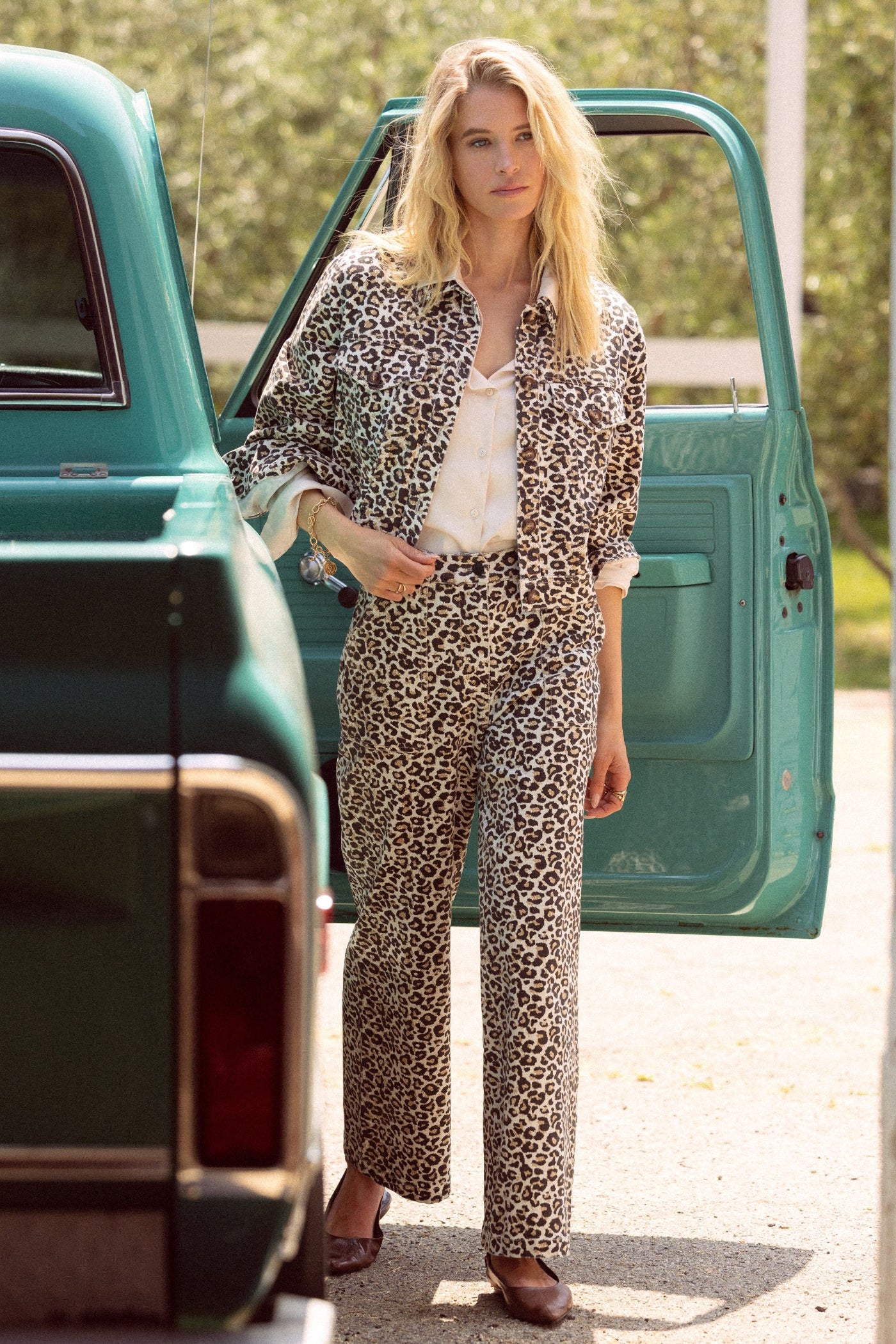 SKIES ARE BLUE WASHED LEOPARD PRINT PANTS – A HIGH-WAISTED STATEMENT PANT WITH A FRONT SEAM AND SUBTLE EDGE