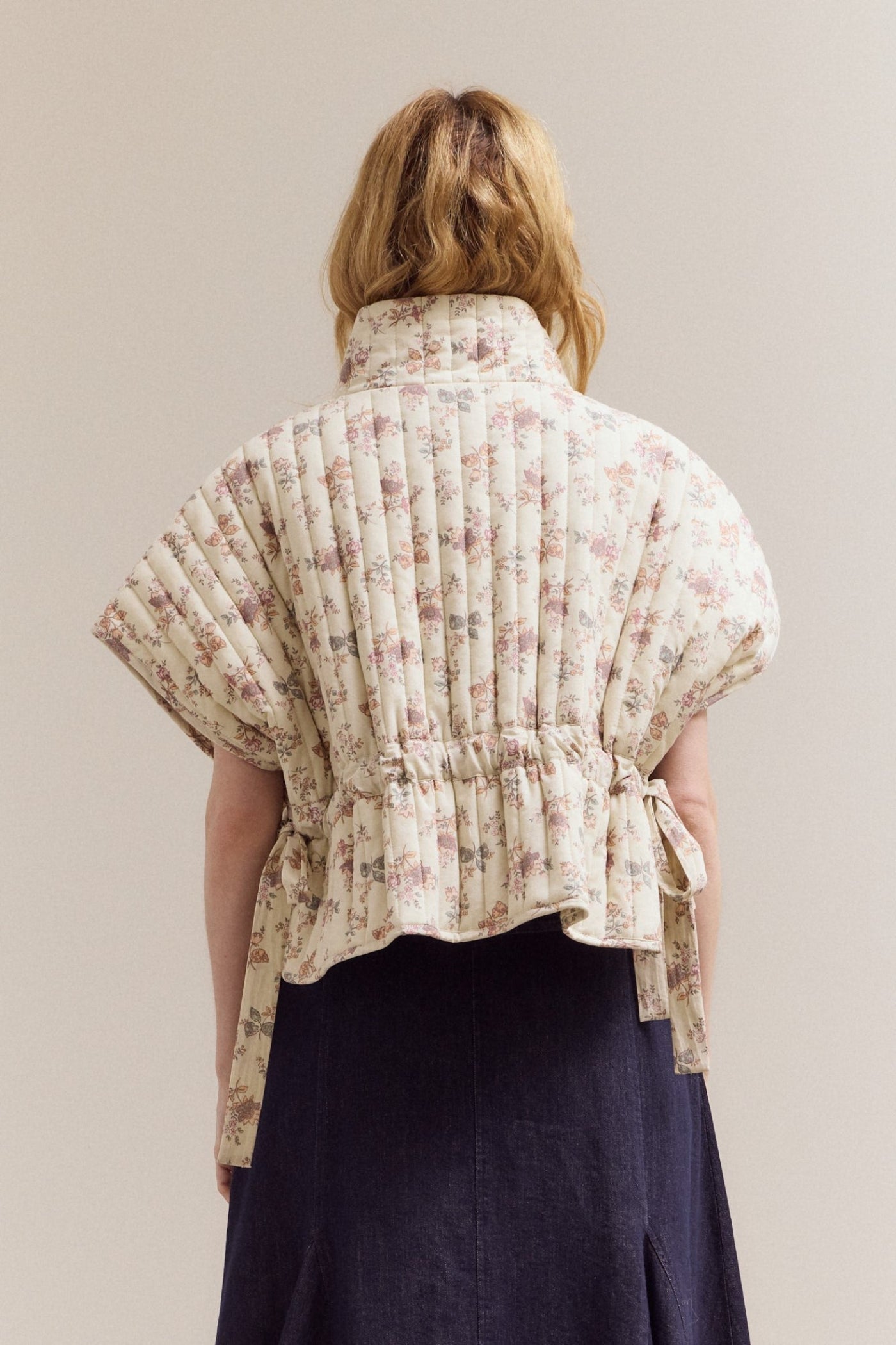 QUILTED FLORAL CINCHED VEST
