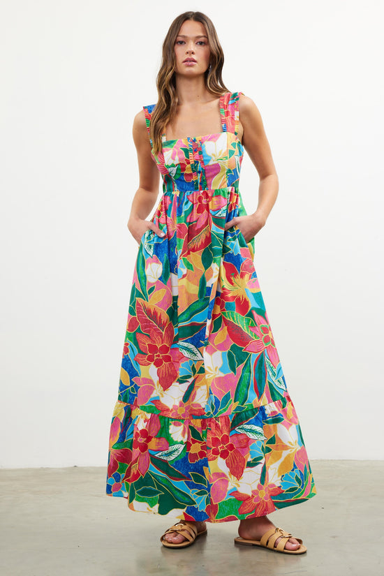 SKIES ARE BLUE THE PRINTED RUFFLE TIERED MAXI DRESS – A TROPICAL MULTICOLORED STATEMENT WITH TIE-BACK DETAIL AND FLOWING LAYERS