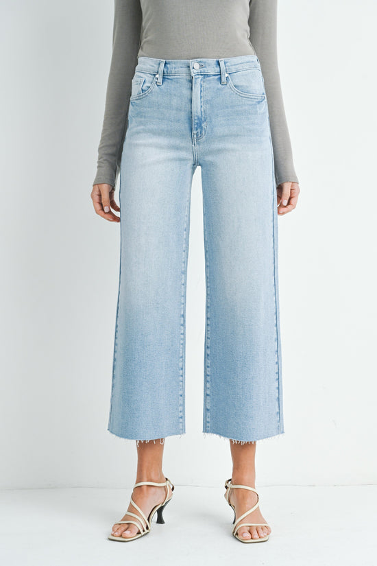 JUST BLACK DENIM SCISSOR CUT WIDE LEG – HIGH-RISE LIGHT WASH JEANS WITH A RAW HEM AND RELAXED FLARE