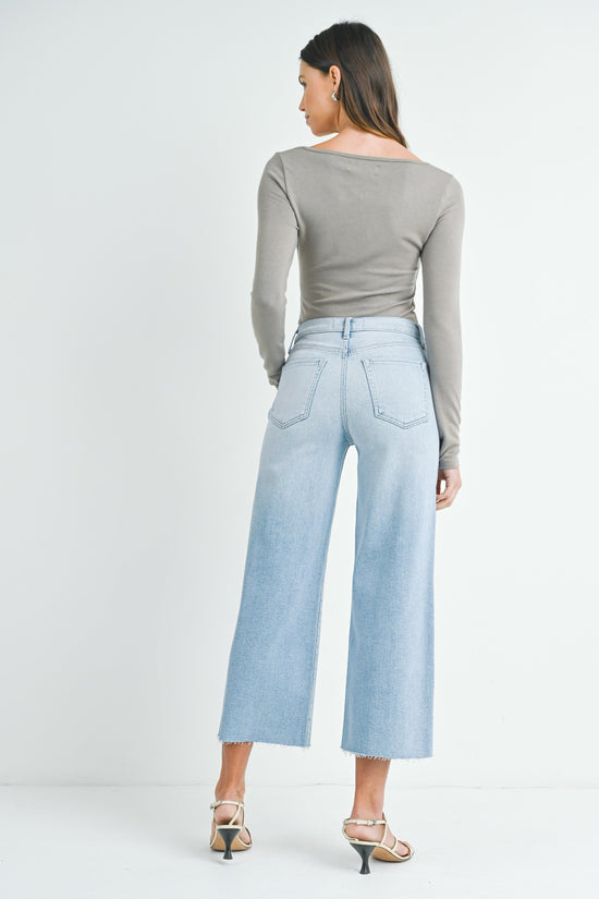 JUST BLACK DENIM SCISSOR CUT WIDE LEG – HIGH-RISE LIGHT WASH JEANS WITH A RAW HEM AND RELAXED FLARE