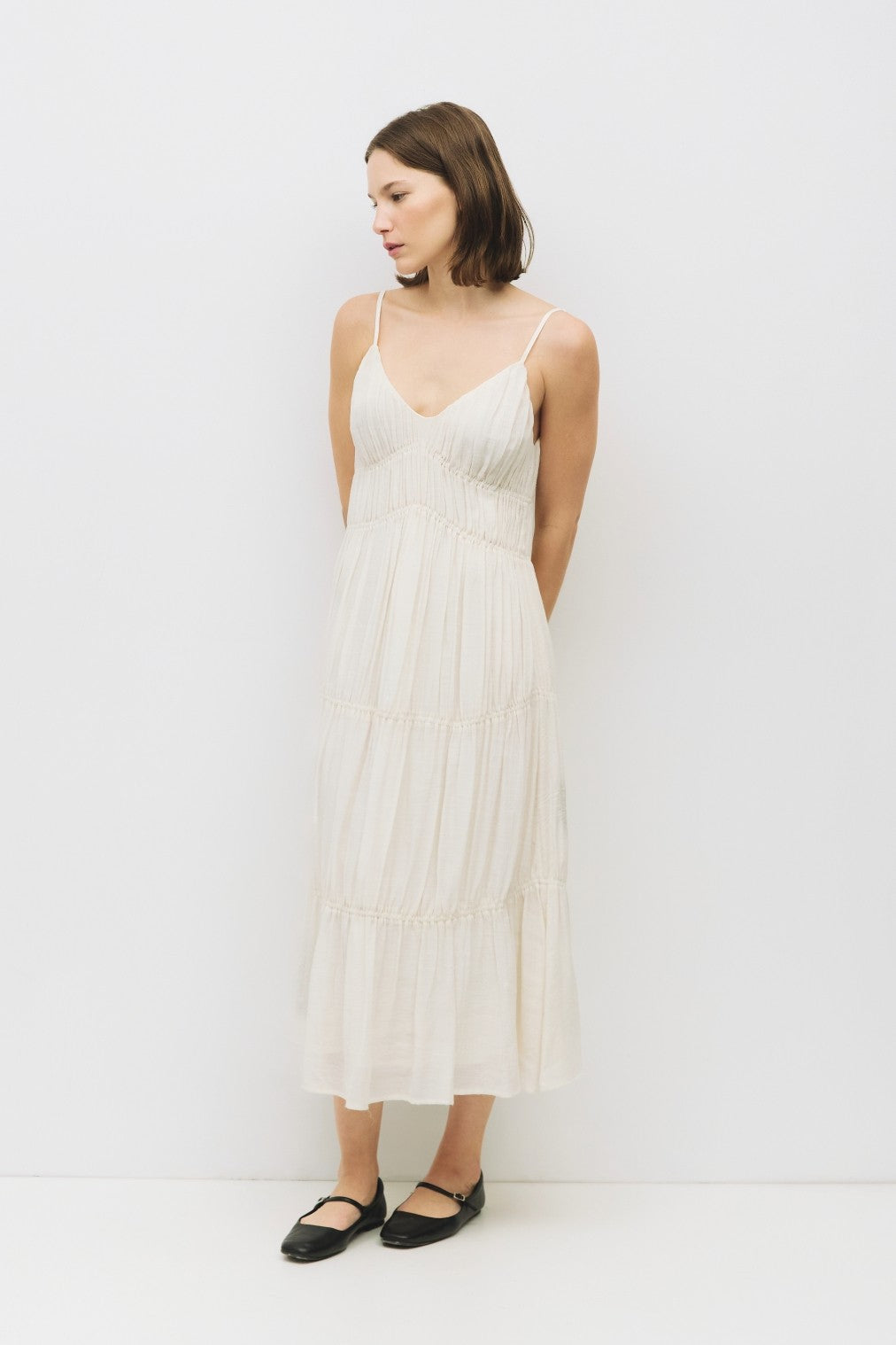 MOD REF THE KENDRA DRESS – A TEXTURED, FLOWING MAXI WITH SPAGHETTI STRAPS AND A RELAXED SILHOUETTE CREAM DRESS