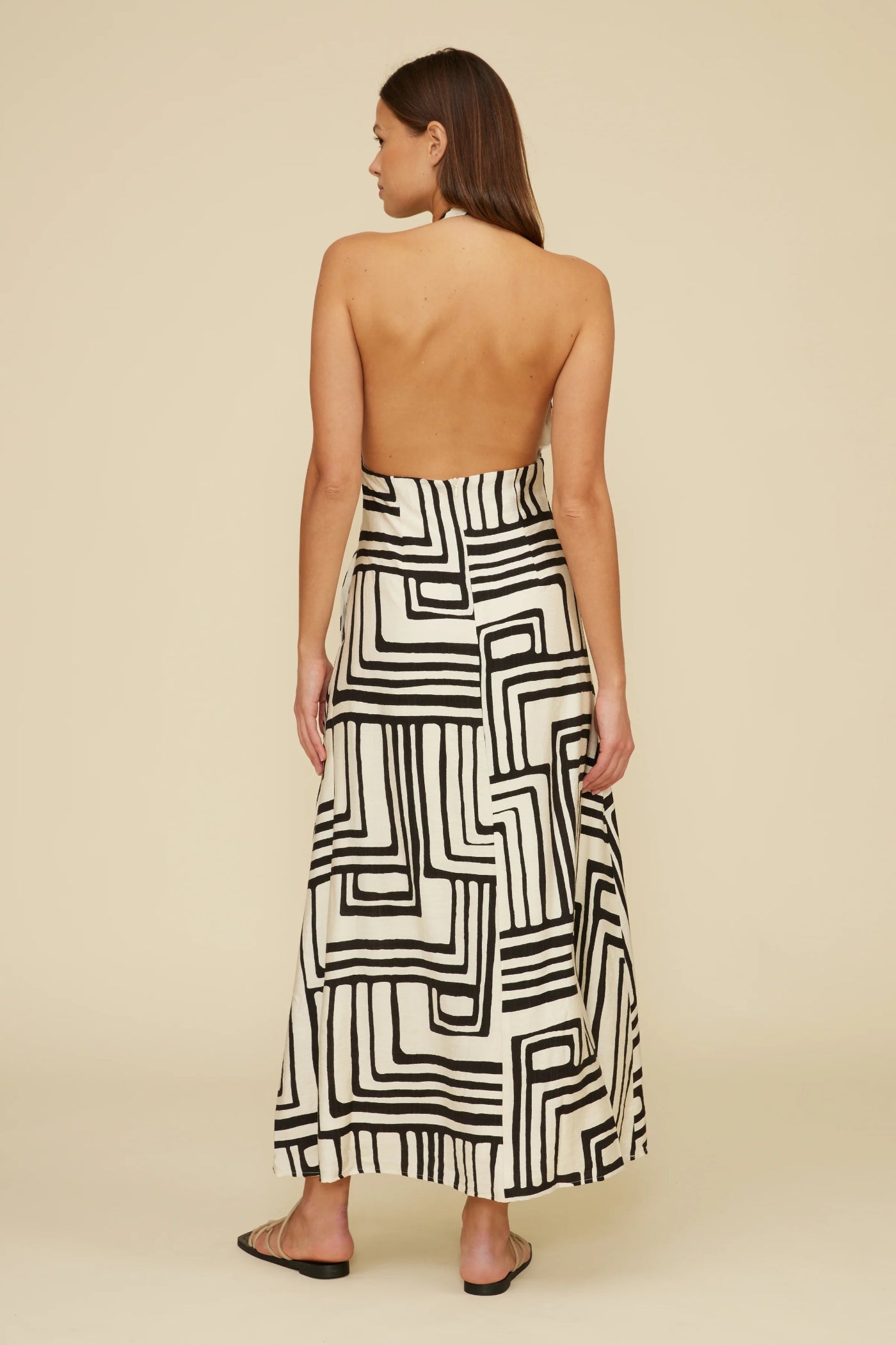 LUCY PARIS ANJELICA HALTER DRESS – A BLACK ABSTRACT PRINT MAXI WITH A STRIKING OPEN BACK AND HALTER NECKLINE