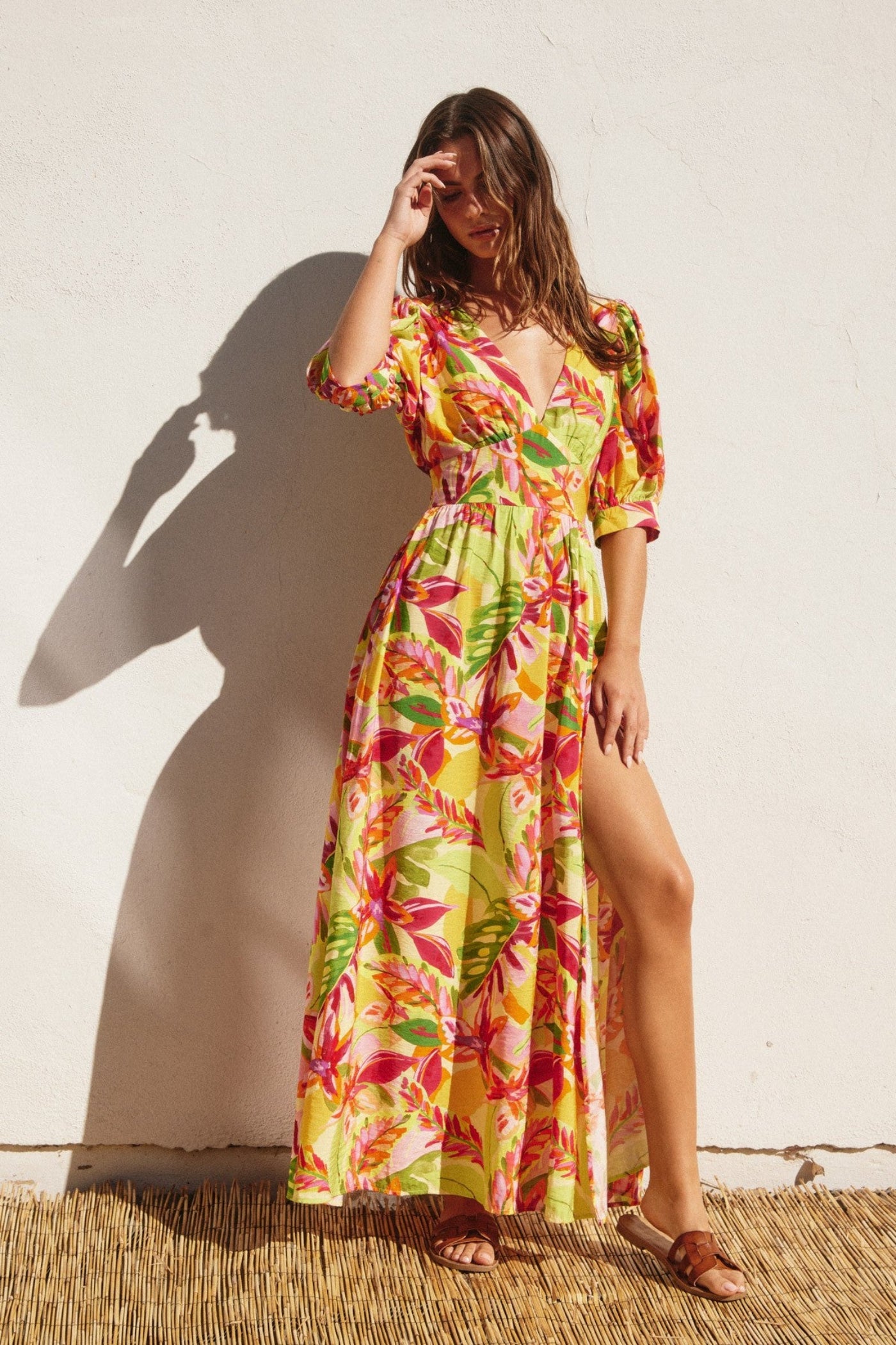 DRESS FORUM WHITE LOTUS SURPLICE SLIT MAXI DRESS – A TROPICAL FLORAL MAXI WITH A CINCHED WAIST AND AIRY SLIT SKIRT