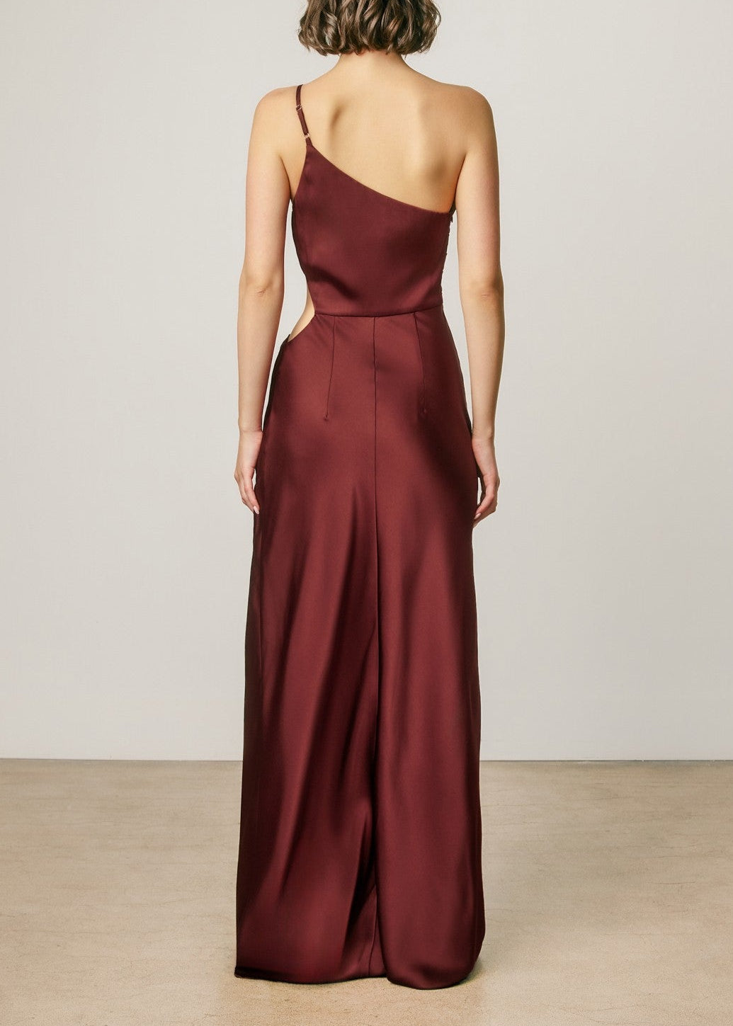 SATIN BURGUNDY ONE-SHOULDER MAXI DRESS WITH HIGH SLIT AND SIDE CUT OUT 