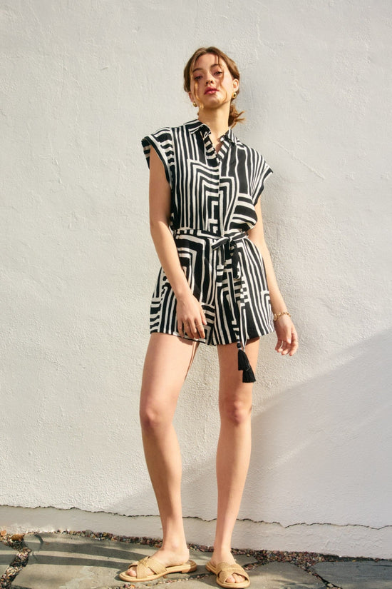 RUNAWAY BUTTON DOWN ROMPER – A PRINTED ONE-PIECE WITH TAILORED DETAILS AND A FLATTERING WAIST TIE