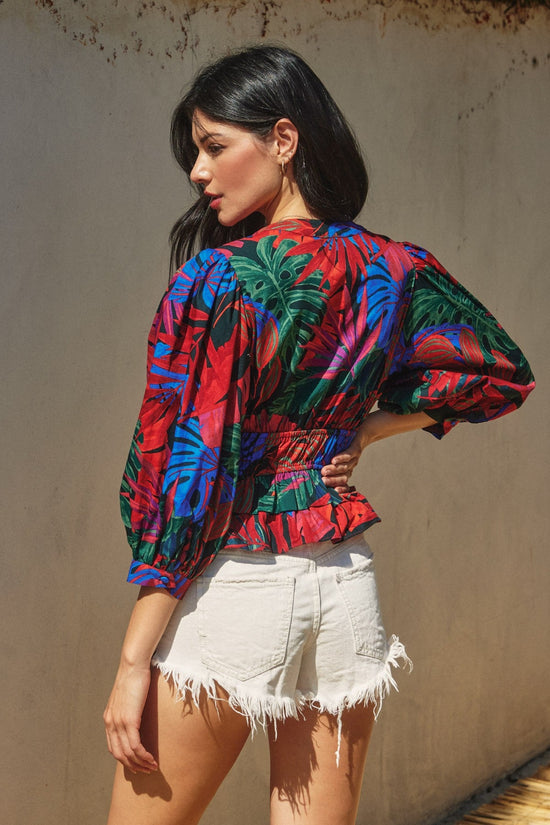 DRESS FORUM HOT SHOT CINCHED WAIST FLARED HEM TOP – A TROPICAL PRINT COTTON TOP WITH A CINCHED WAIST AND FLIRTY FLARED HEM