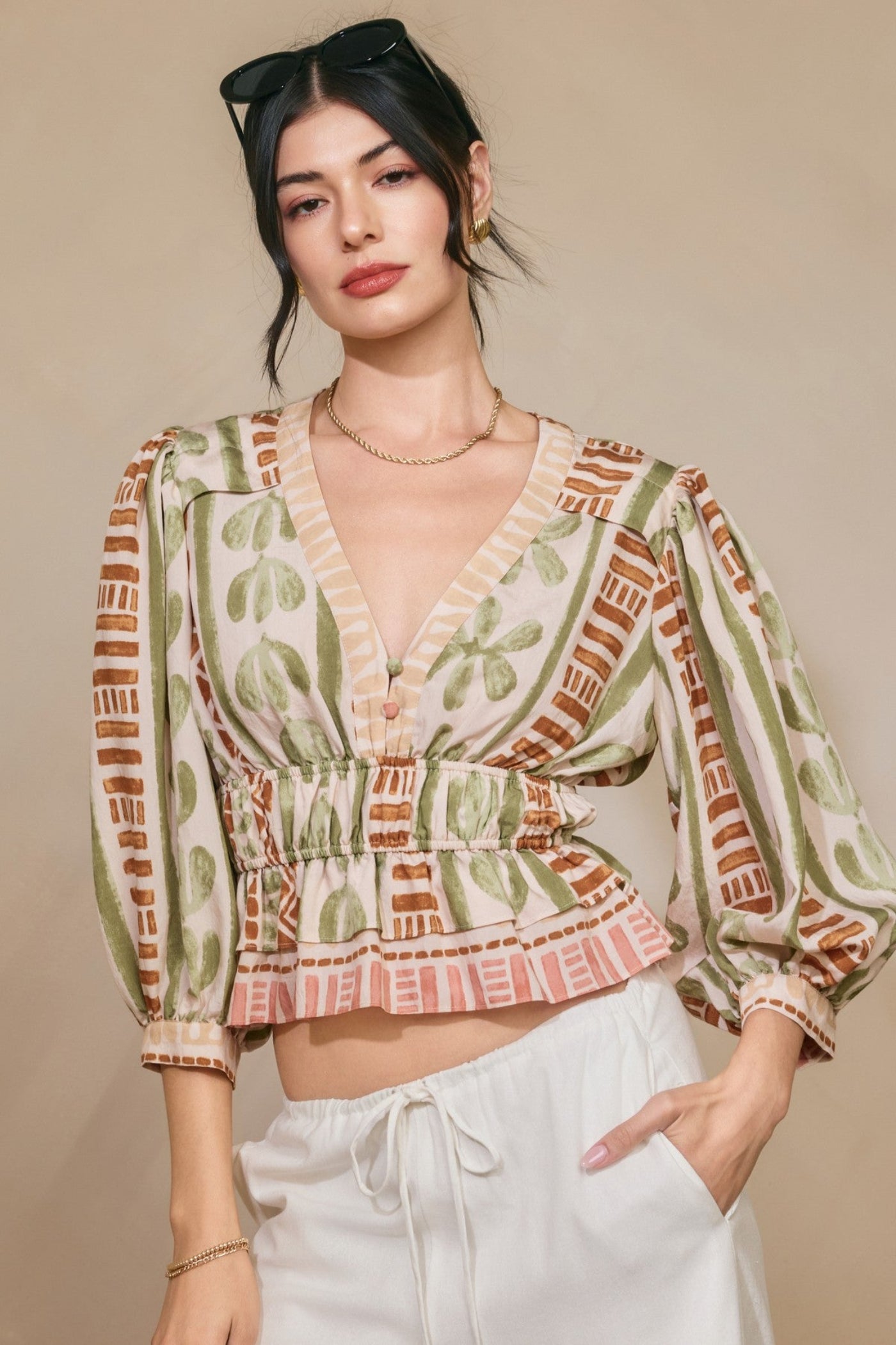 CINCHED WAIST FLARED HEM TOP