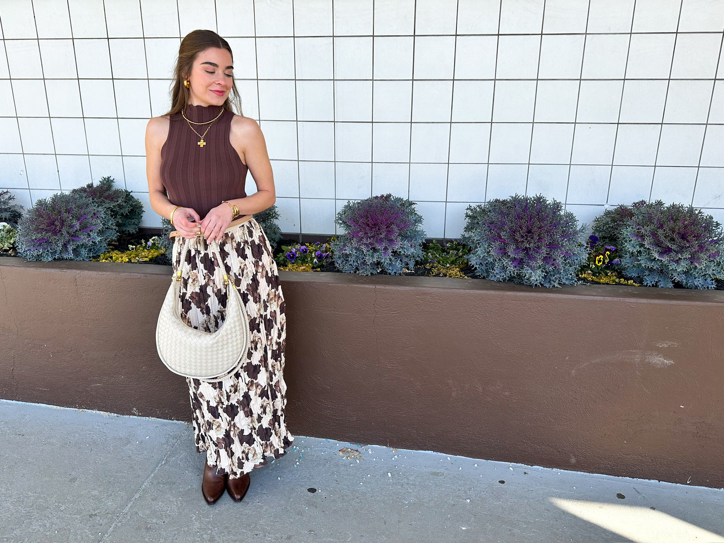 WOMAN IN SPRING SKIRT AND BROWN TOP