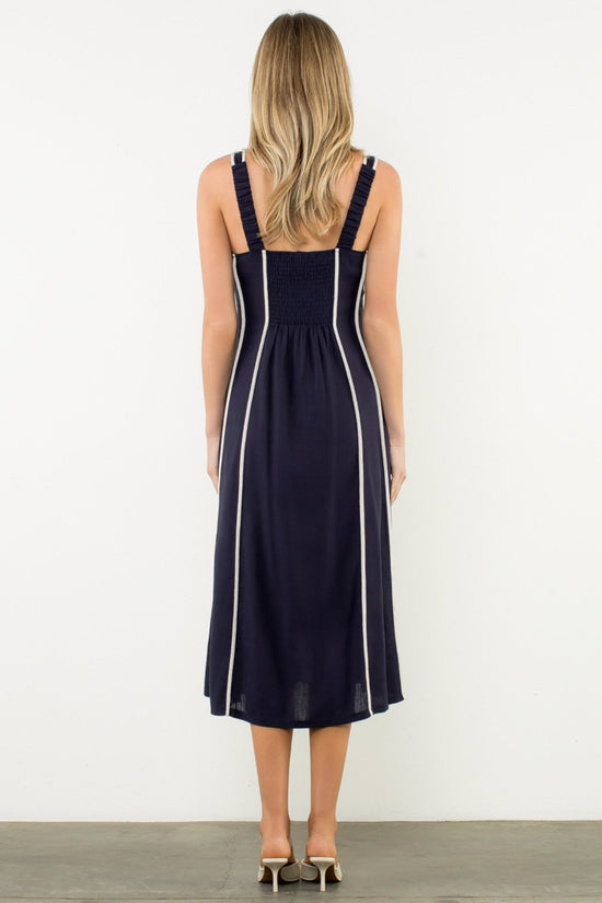 THML VERTICAL TRIM SLEEVELESS MIDI DRESS – A STRIPED MIDI DRESS WITH MINIMAL LINES AND A CLEAN SILHOUETTE