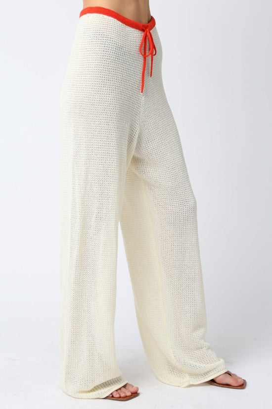 OLIVACEOUS MAO LINE KNIT PANTS – ADJUSTABLE STRAP STRAIGHT-FIT PANTS WITH VIBRANT ORANGE DETAIL