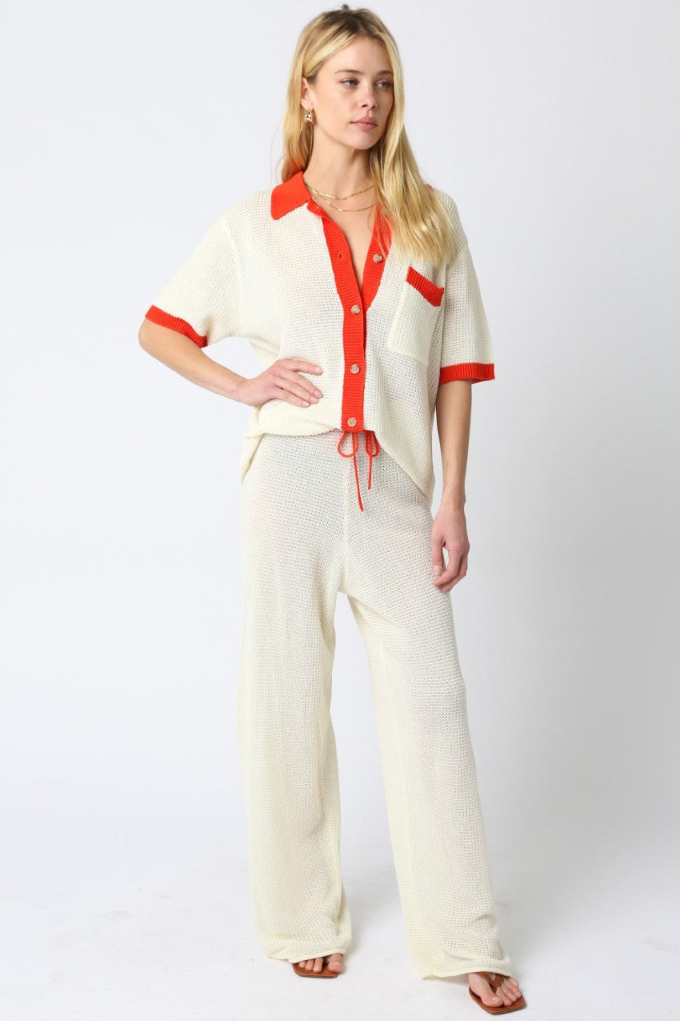 OLIVACEOUS MAO LINE KNIT PANTS – ADJUSTABLE STRAP STRAIGHT-FIT PANTS WITH VIBRANT ORANGE DETAIL