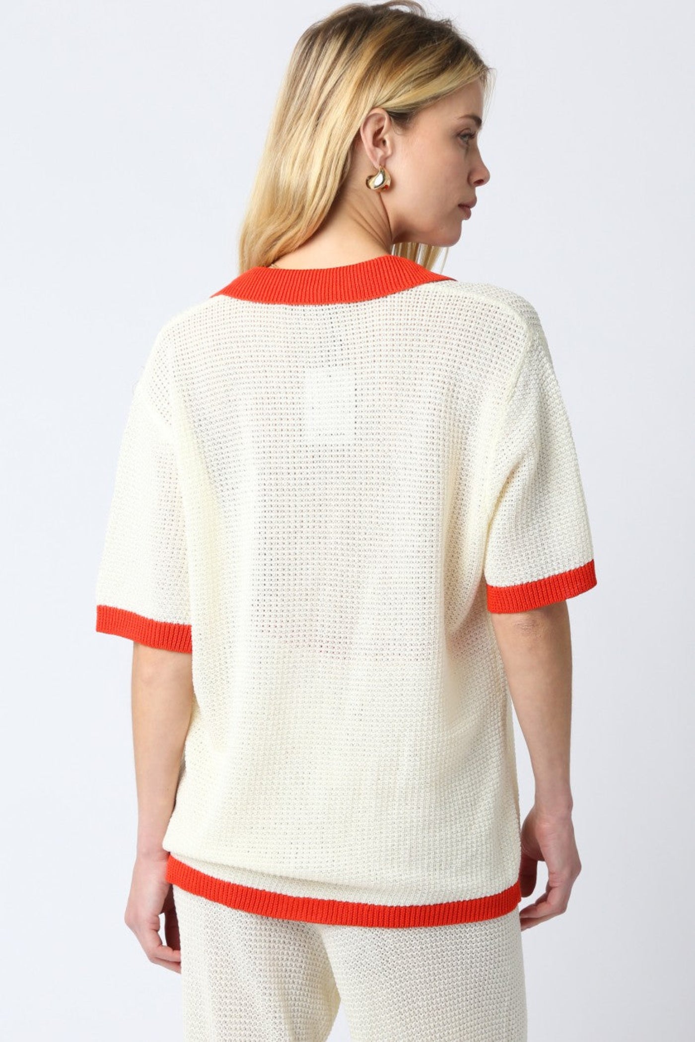 OLIVACEOUS MAO LINE KNIT SWEATER – SHEER BUTTON-DOWN KNIT WITH VIBRANT ORANGE TRIM DETAILS