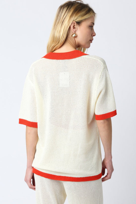 OLIVACEOUS MAO LINE KNIT SWEATER – SHEER BUTTON-DOWN KNIT WITH VIBRANT ORANGE TRIM DETAILS