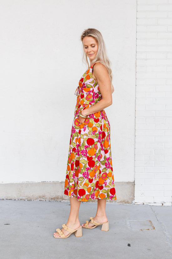 DRESS FORUM FRUIT PRINT MIDI DRESS – A BRIGHT, SUMMER-READY MIDI WITH A FLATTERING FIT AND FEMININE TIE DETAIL