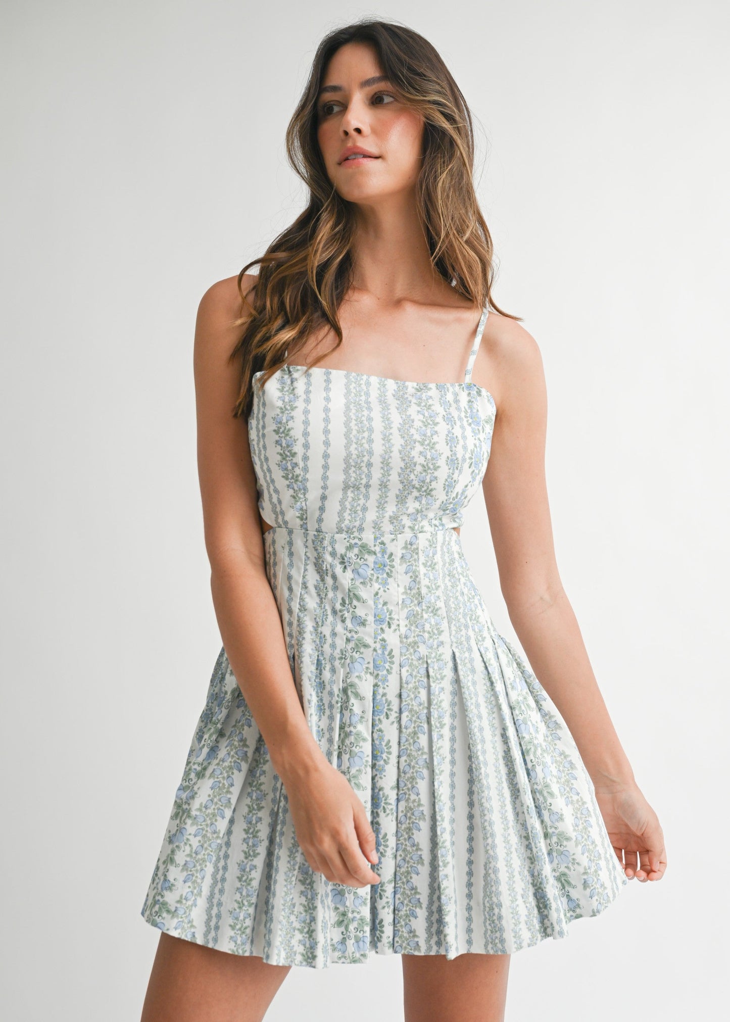 MABLE THE STRIPED FLORAL CUT OUT MINI DRESS – A FLIRTY, PRINTED MINI WITH OPEN BACK AND TIE DETAILS