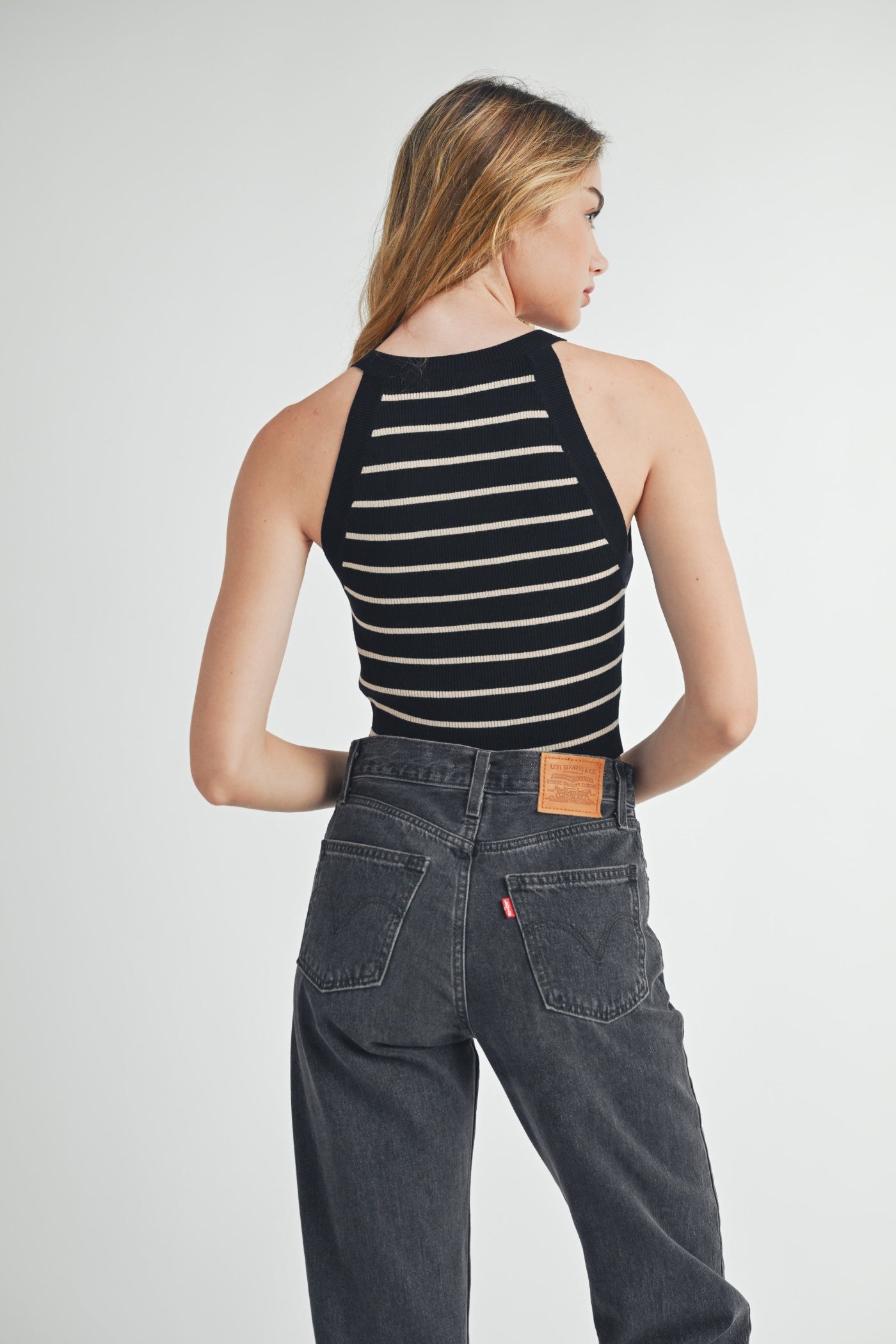 MABLE SLEEVELESS HALTER NECK STRIPED KNIT CROP TOP – A RIBBED KNIT HALTER IN A CROPPED, SPORTY-SWEET SILHOUETTE
