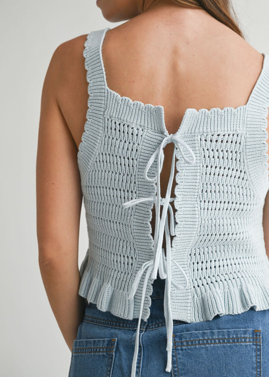 MABLE THE REVERSIBLE CROCHET RUFFLE HEM KNIT TOP – A CROPPED, TIE-FRONT KNIT WITH A PLAYFUL RUFFLED FINISH