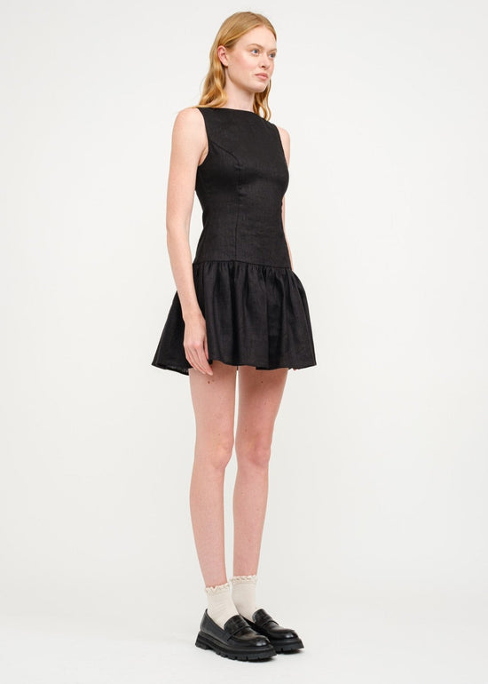 SOFIE THE LABEL THE MADELYN MINI DRESS – A SLEEVELESS LINEN DROP-WAIST MINI WITH A BOAT NECK AND ELEGANT BACK DETAIL BLACK COLOR