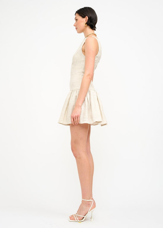 SOFIE THE LABEL THE MADELYN MINI DRESS – A SLEEVELESS LINEN DROP-WAIST MINI WITH A BOAT NECK AND ELEGANT BACK DETAIL NATURAL COLOR