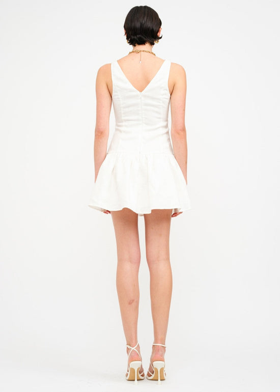 SOFIE THE LABEL THE MADELYN MINI DRESS – A SLEEVELESS LINEN DROP-WAIST MINI WITH A BOAT NECK AND ELEGANT BACK DETAIL WHITE COLOR