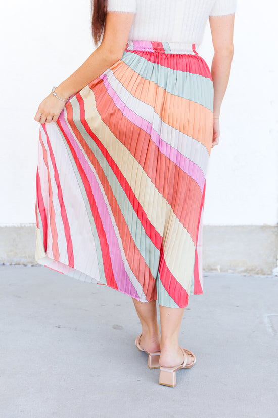 SKIES ARE BLUE PASTEL STRIPED PLEATED MIDI SKIRT WITH STRETCHY WAISTBAND