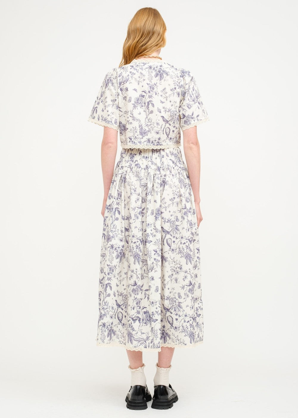 SOFIE THE LABEL THE AMELIE FLORAL BLOUSE – A COTTON-POPLIN PRINTED TOP WITH A CREAM AND NAVY FLORAL PALETTE