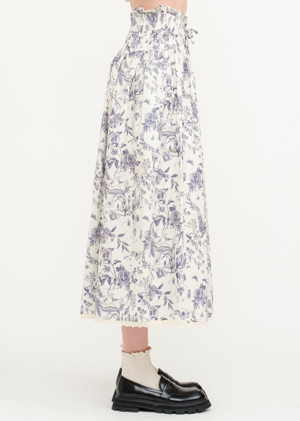 SOFIE THE LABEL THE AMELIE FLORAL SKIRT – A COTTON-POPLIN MIDI WITH NAVY FLORALS, LACE TRIM, AND A DRAWSTRING WAIST