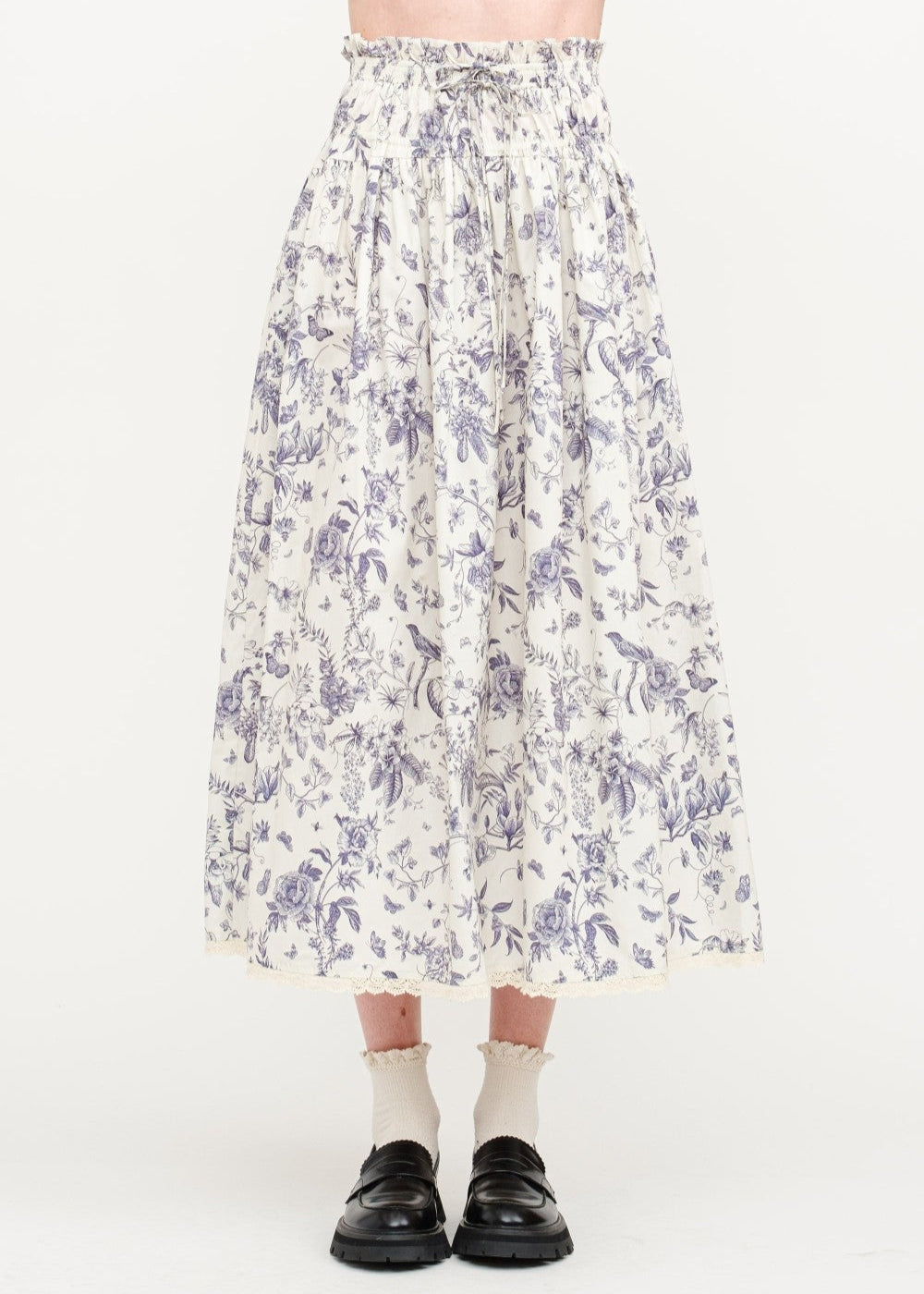 SOFIE THE LABEL THE AMELIE FLORAL SKIRT – A COTTON-POPLIN MIDI WITH NAVY FLORALS, LACE TRIM, AND A DRAWSTRING WAIST