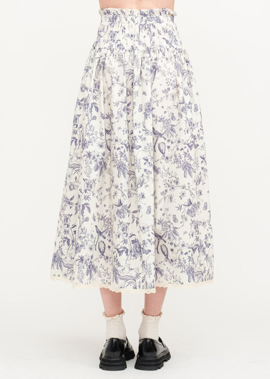 SOFIE THE LABEL THE AMELIE FLORAL SKIRT – A COTTON-POPLIN MIDI WITH NAVY FLORALS, LACE TRIM, AND A DRAWSTRING WAIST