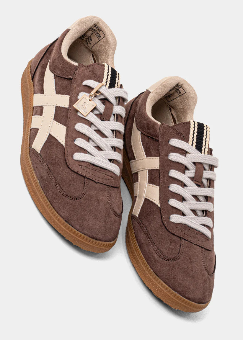 SHU SHOP Brown suede sneakers with white laces on a light gray background