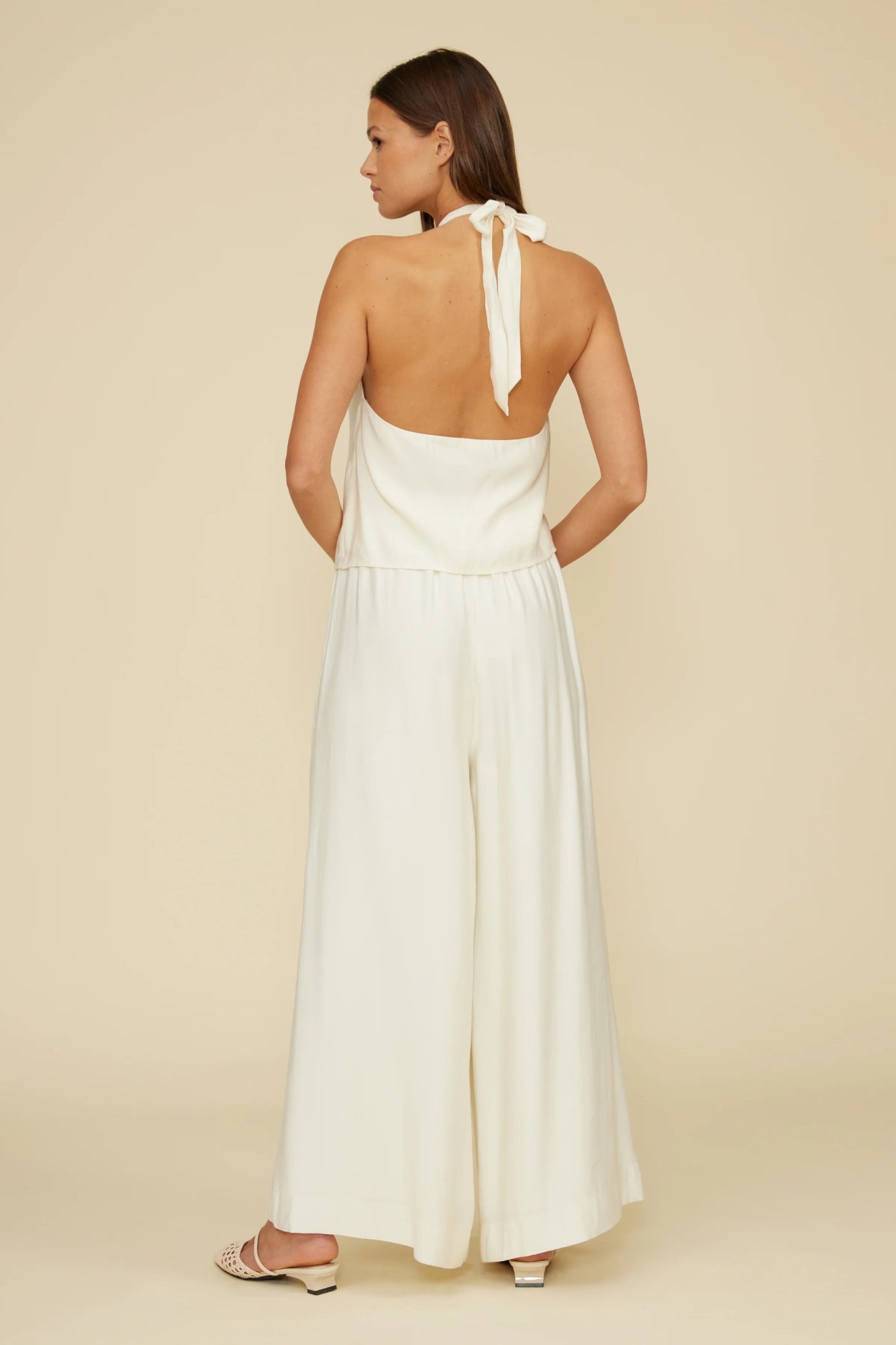 LUCY PARIS WILLA HALTER TOP – AN IVORY HALTER BLOUSE WITH BEADED DETAILING AND AN OPEN BACK