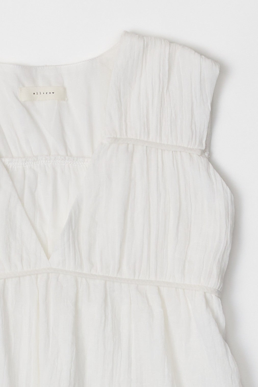 MOD REF CORA PANELED OFF WHITE SLEEVELESS TOP V NECKLINE