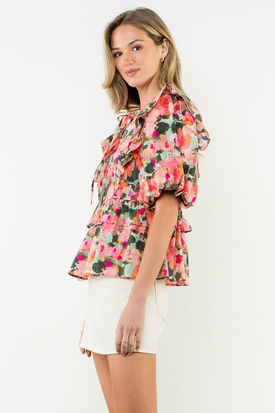 THML RUFFLE TIE NECK PUFF SLEEVE FLORAL TOP – A MULTICOLOR WOVEN COTTON BLOUSE WITH ROMANTIC DETAILING
