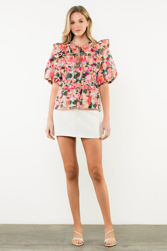 THML RUFFLE TIE NECK PUFF SLEEVE FLORAL TOP – A MULTICOLOR WOVEN COTTON BLOUSE WITH ROMANTIC DETAILING